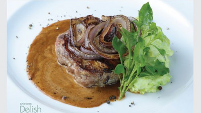 New Zealand Rip Eye Steak with Brandy and White Bean Sauc