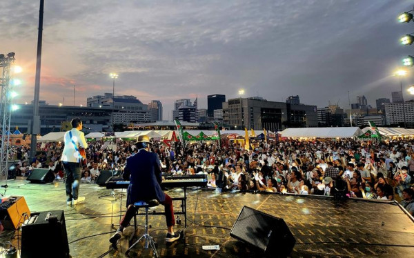 The Royal Bangkok Sports Club nbsp 1 person saxophone speaker accordion and crowd