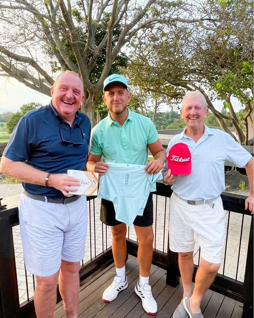 3 people people standing shorts and outdoors