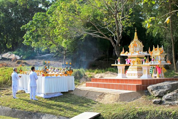 Banyan Golf Club Hua Hin 2 people outdoors and temple