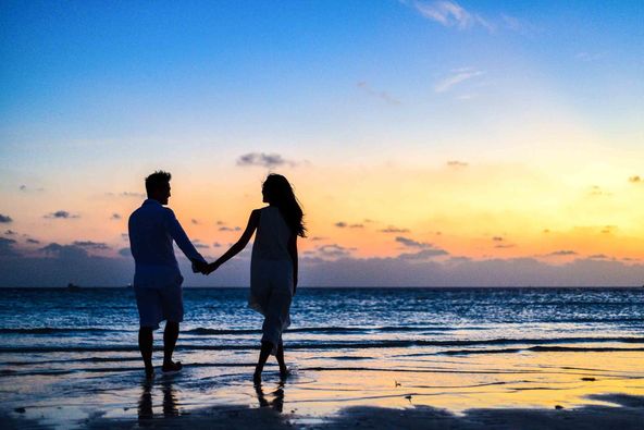 Banyan Golf Club Hua Hin 2 people people standing ocean nature beach twilight and sky