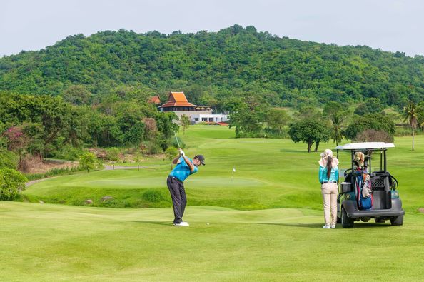 Banyan Golf Club Hua Hin 3 people golf course grass and nature