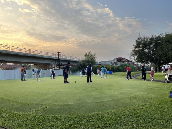 Royal Hua Hin Golf Course 15 people and grass