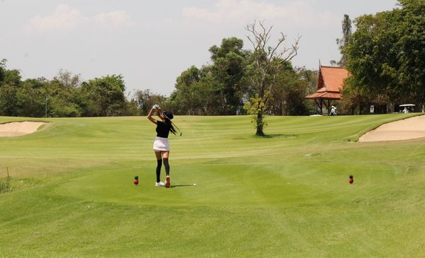 Banyan Golf Club Hua Hin 1 person playing a sport grass and golf course