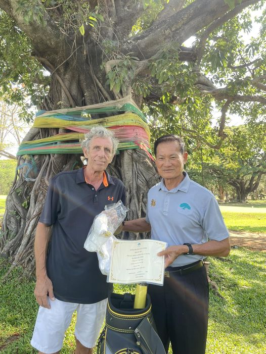 Royal Hua Hin Golf Course 2 people outdoors and tree