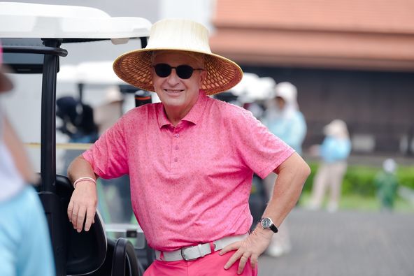 Banyan Golf Club Hua Hin 2 people people golfing golf cart and hat