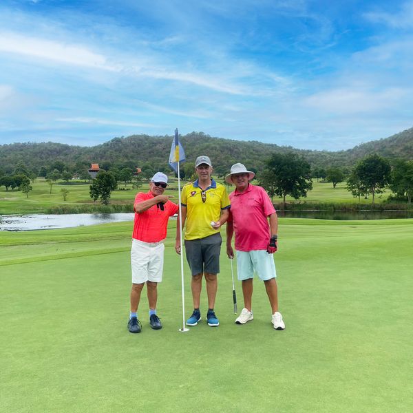 Banyan Golf Club Hua Hin 3 people people golfing and golf course