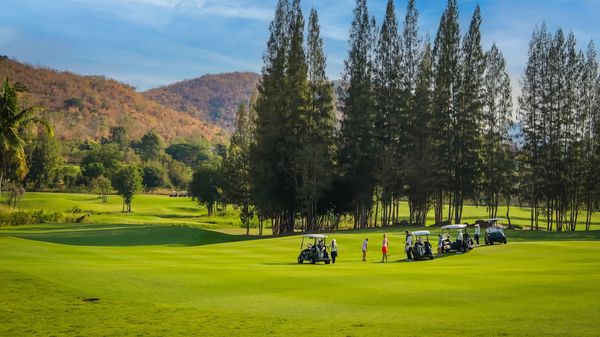 Banyan Golf Club Hua Hin 6 people people golfing golf cart and golf course