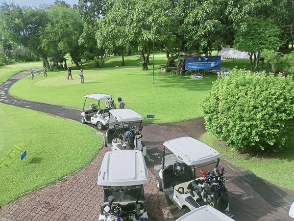 Royal Hua Hin Golf Course 3 people people golfing golf cart and golf course