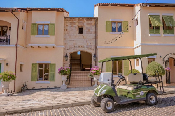 Toscana Valley golf golf cart golf course and text