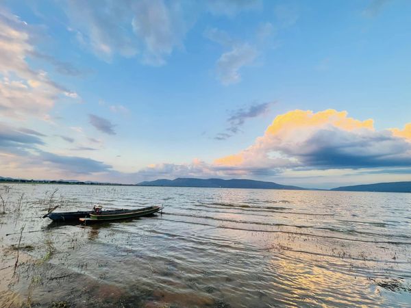 Mountain Creek Golf Resort And Residences nbsp 1 person kayak lake twilight and cloud