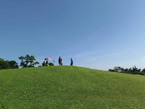 Wangjuntr Golf Park 3 people grass and nature