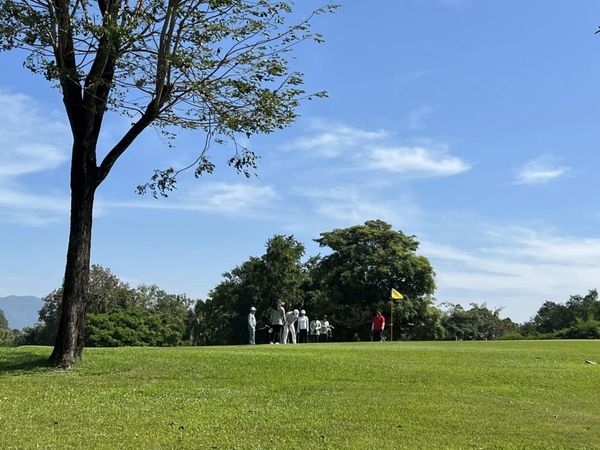 Bangpra Golf Club and Resort 3 people grass and tree