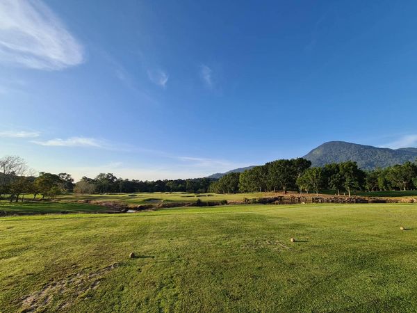 Chatrium Golf Resort Soi Dao Chanthaburi grass nature tree and sky