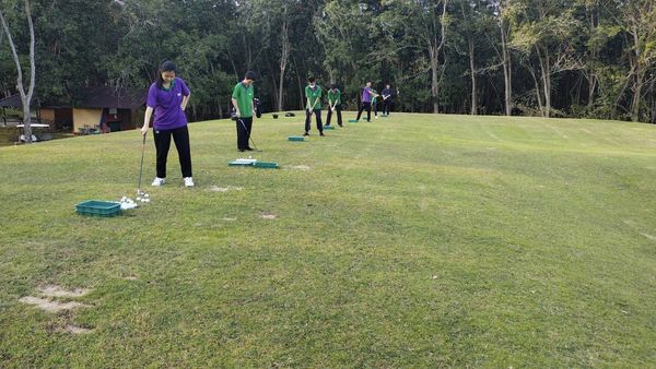 Wangjuntr Golf Park 7 people people standing and grass