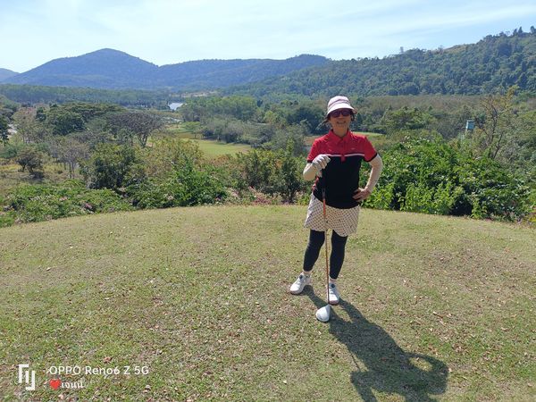 Wangjuntr Golf Park 1 person standing and grass-4