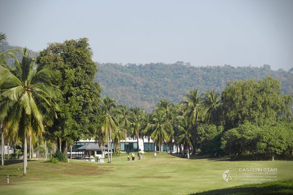 Eastern Star Country Club amp Resort 2 people tree grass sky and nature