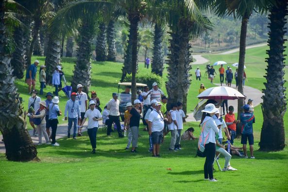 Amata Spring Country Club 13 people people standing and grass