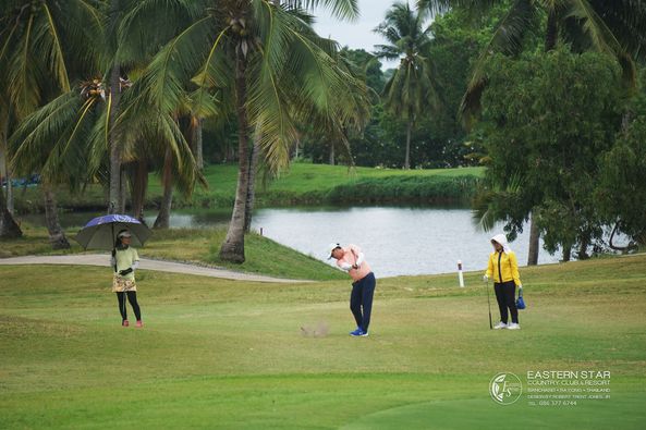 Eastern Star Country Club amp Resort 3 people people golfing golf course and text