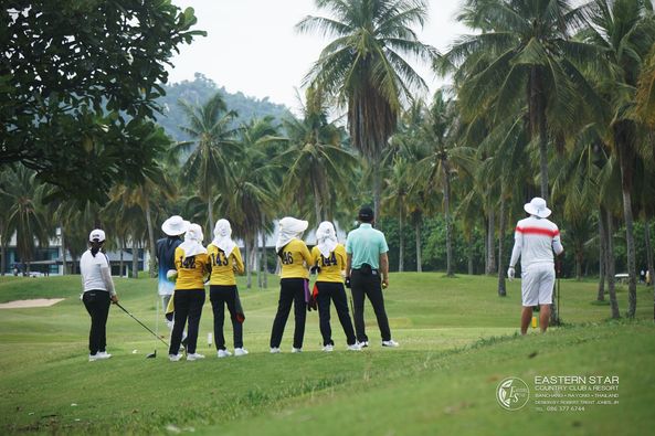 Eastern Star Country Club amp Resort 7 people people golfing golf cart golf course and text