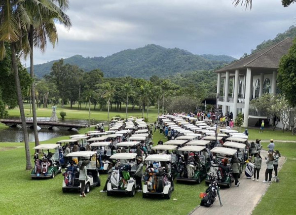 Bangpra Golf Club and Resort 1 person golfing golf cart and golf course