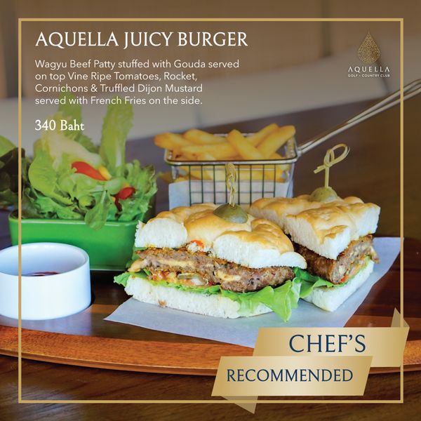 Aquella Golf amp Country Club food and AQUELLA JUICY BURGER Wagyu Beef Patty stuffed with Gouda served on top Vine Ripe Tomatoes Rocket Cornichons Truffled Dijon Mustard served with French Fries on the side 340 aht AQUELLA GOLF COUNTRYCLU DUNTE CHEF S RECOMMENDED