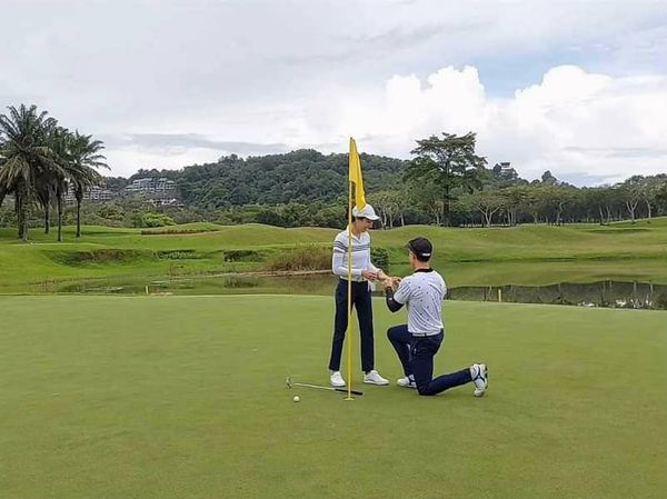 Blue Canyon Country Club 2 people golf course and grass