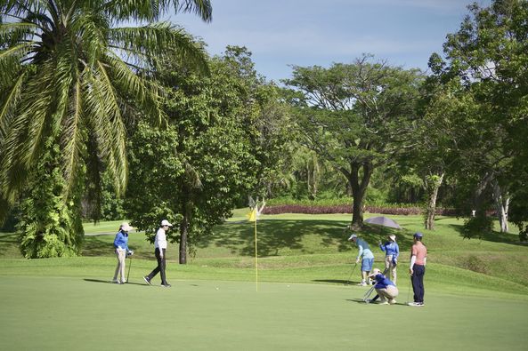 Blue Canyon Country Club 6 people people golfing golf cart and golf course