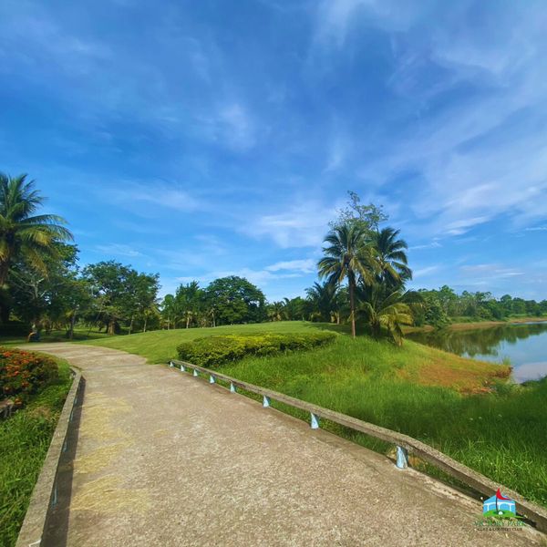 Victory Park Golf amp Country Club road lake cloud and grass