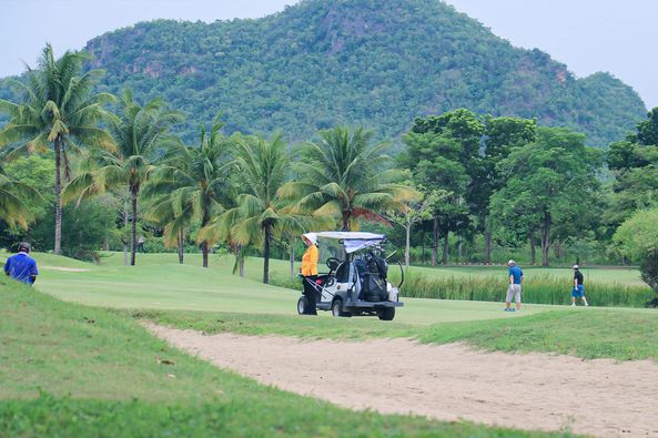 Mida Golf Club Kanchanaburi 5 people people golfing golf cart golf course and grass